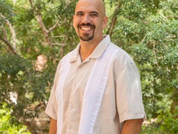 Dr. Daniel E. Martínez