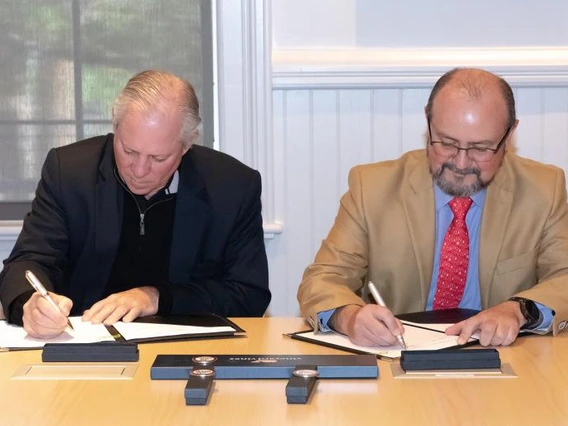 Robert Robbins and David Vazquez sign MOU